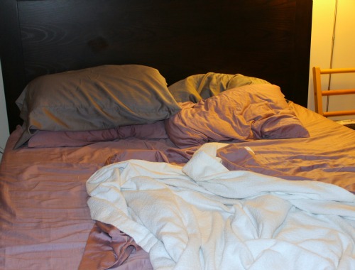 unmade bed, messy bed