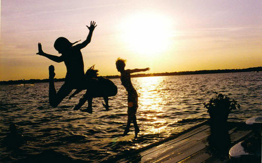 Three Kids Jumping  by Teri Hawley
