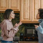 Multiethnic women having a conflict in the kitchen